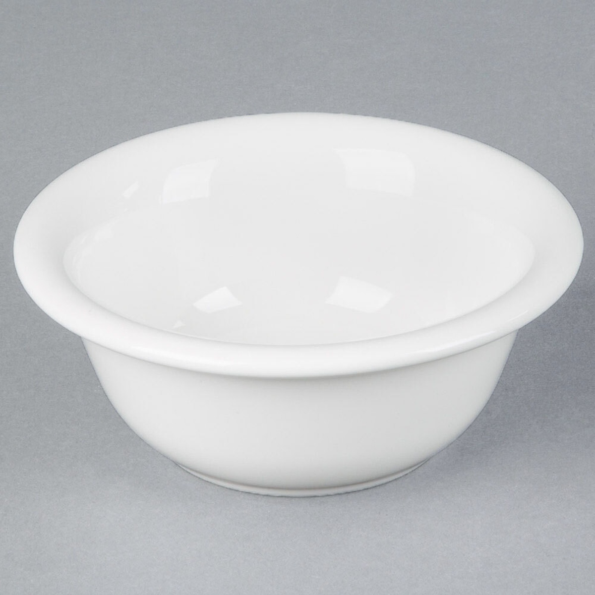 Tuxton BWB-0809 white china pot pie bowl with flared rim, shown from a three-quarter angle