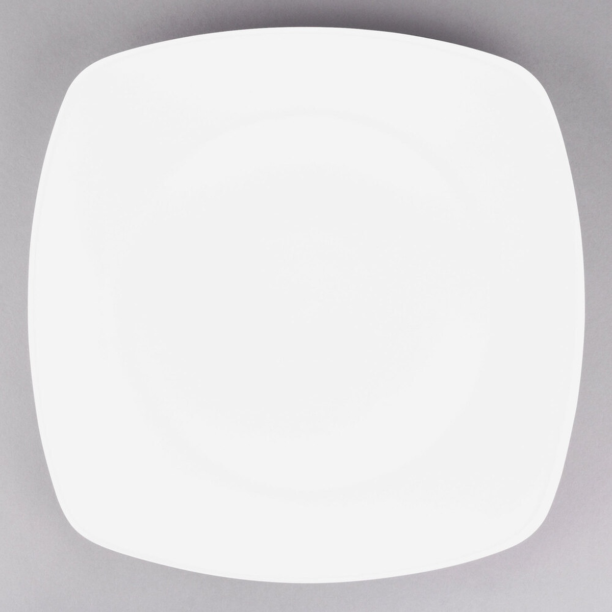Tuxton BWH-126C 12-3/4 inch white square china plate top-down view showing rounded corners and smooth surface