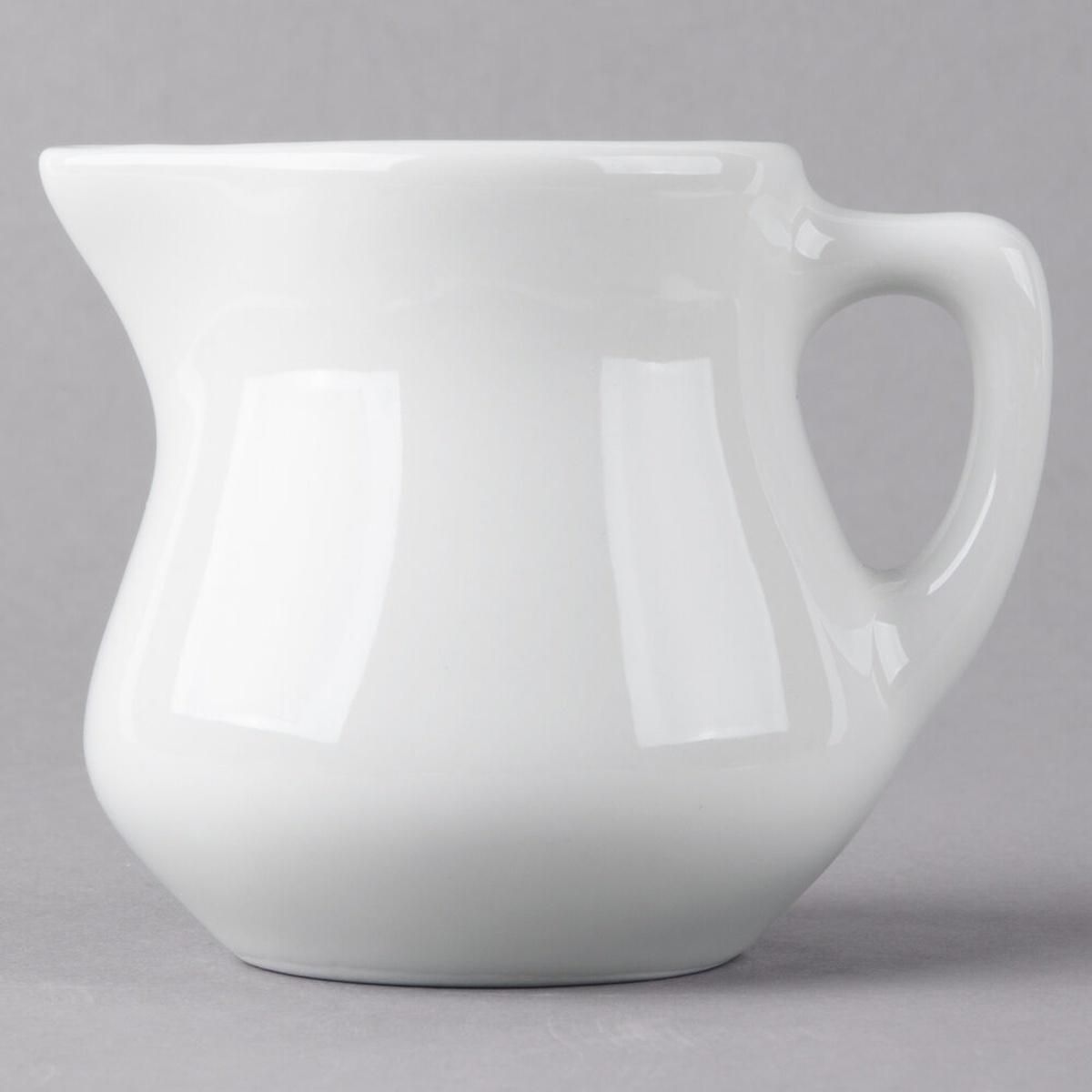 Tuxton BWR-035 3.5 oz white china creamer pourer with handle and spout
