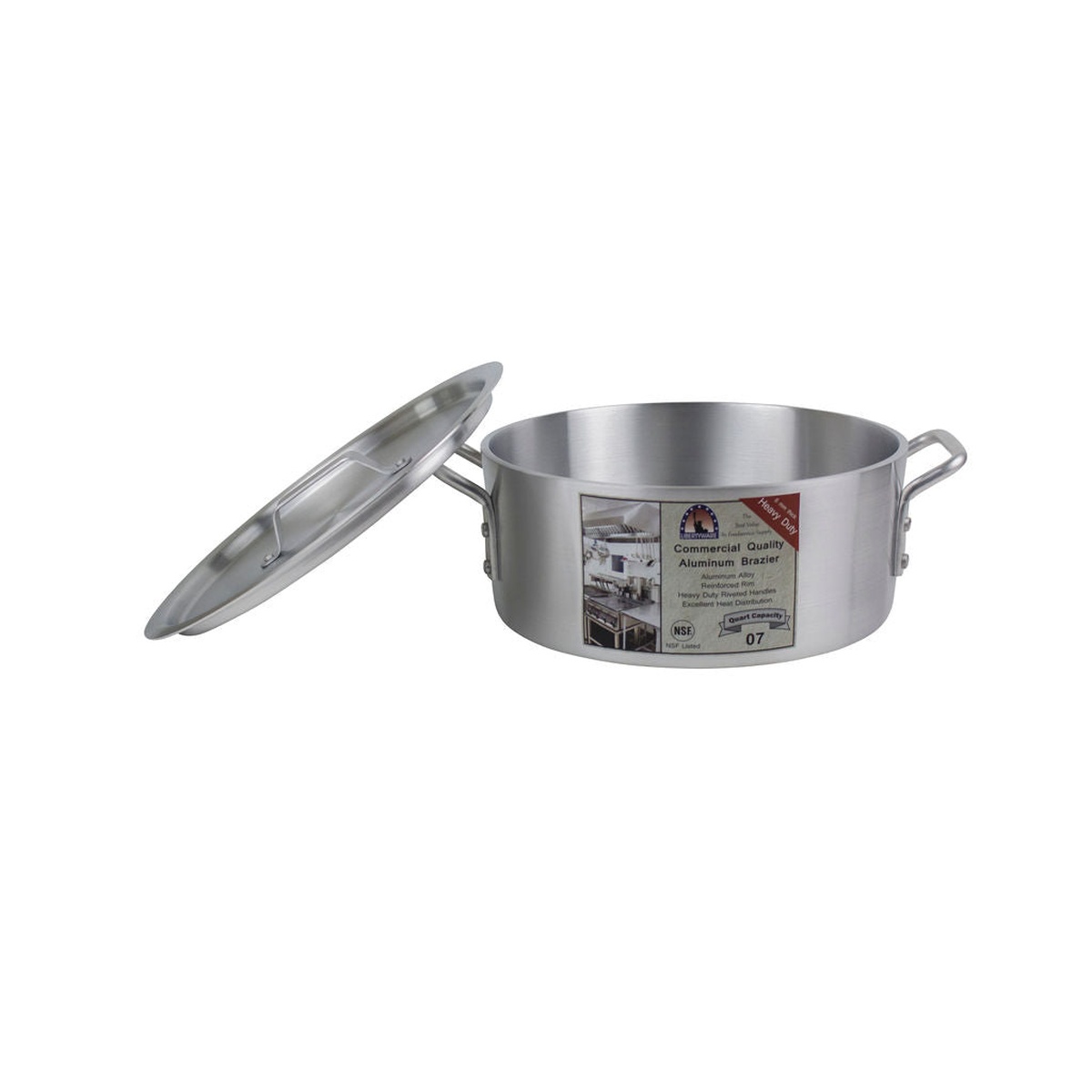 Aluminum brazier pan with matching lid leaning against the side