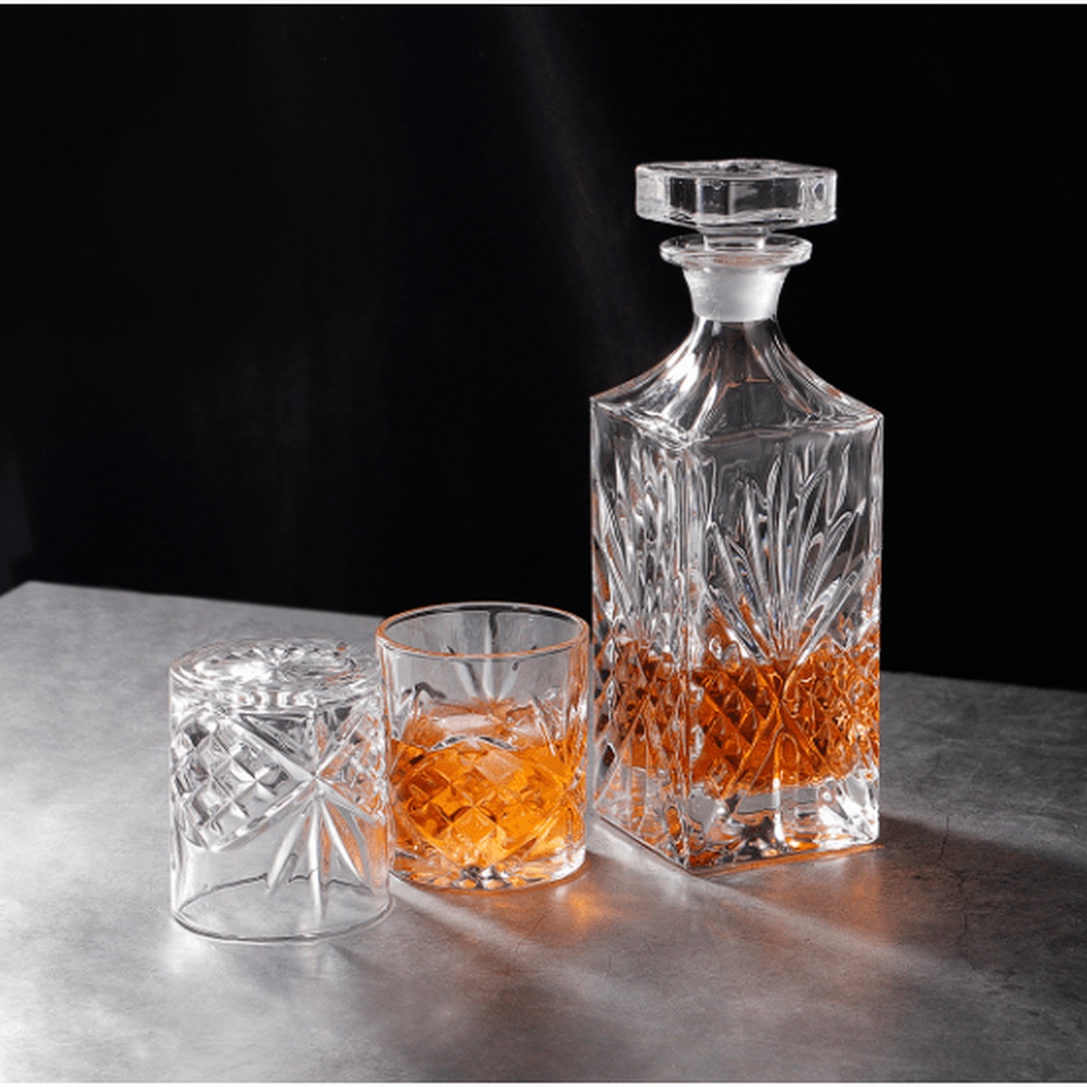 Enhanced Glassware 30 oz crystal-cut decanter with stopper alongside two 7.5 oz rocks glasses