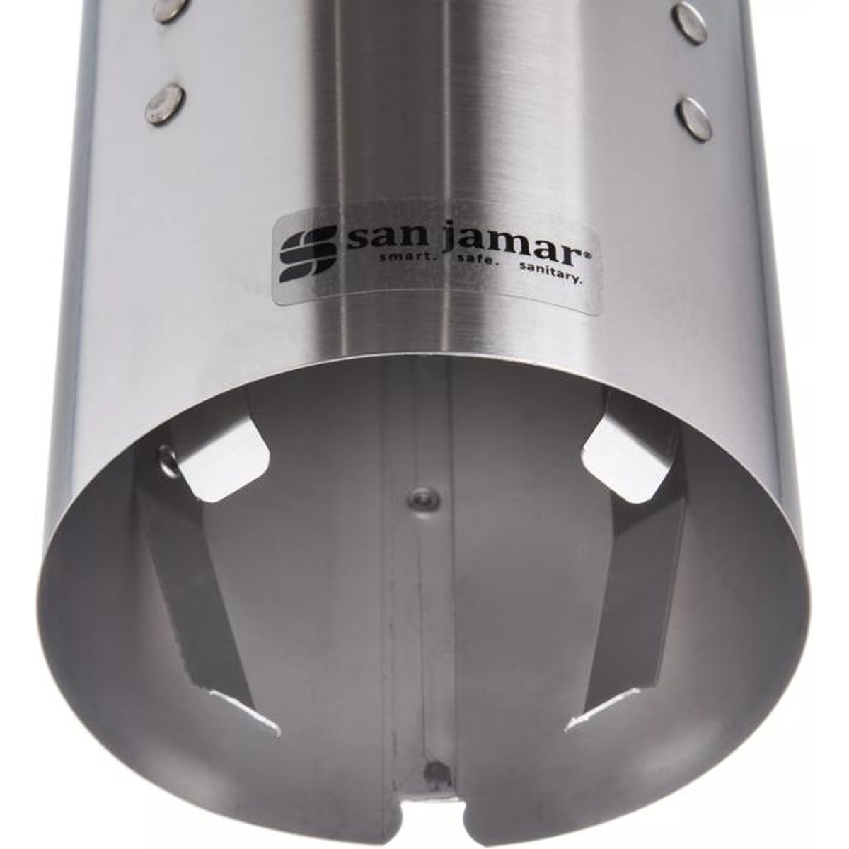 Close-up of San Jamar C3250SS self-adjusting bottom dispensing mechanism with spring-loaded retaining tabs