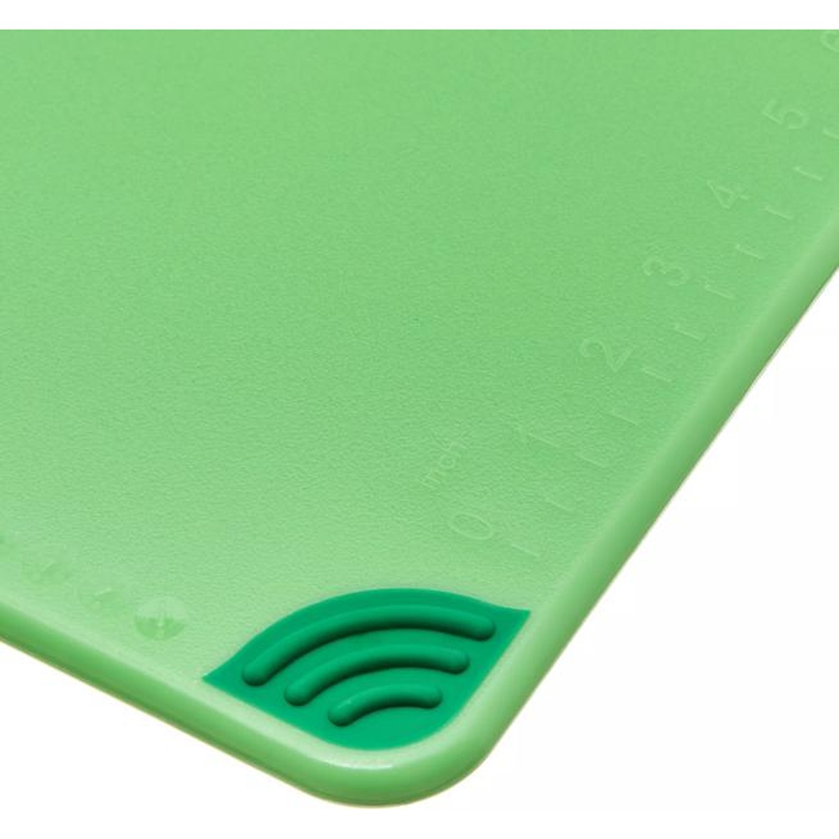 Close-up of San Jamar Saf-T-Grip green cutting board corner showing molded ruler measurement markings