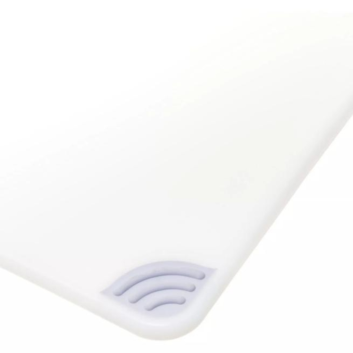 Close-up detail of San Jamar Saf-T-Grip anti-slip rubber grip corner on white cutting board