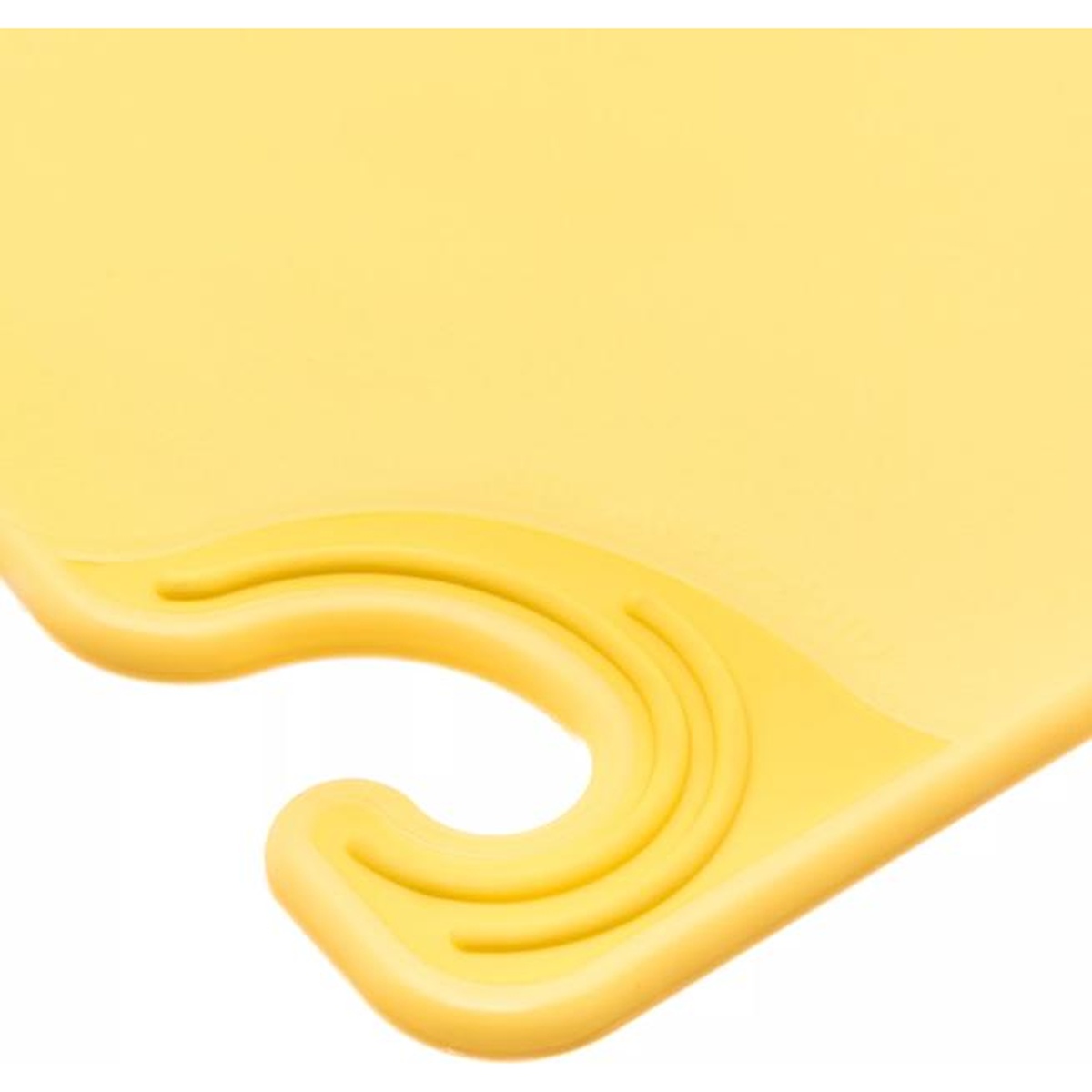 Close-up of the molded food safety hook on the San Jamar yellow cutting board