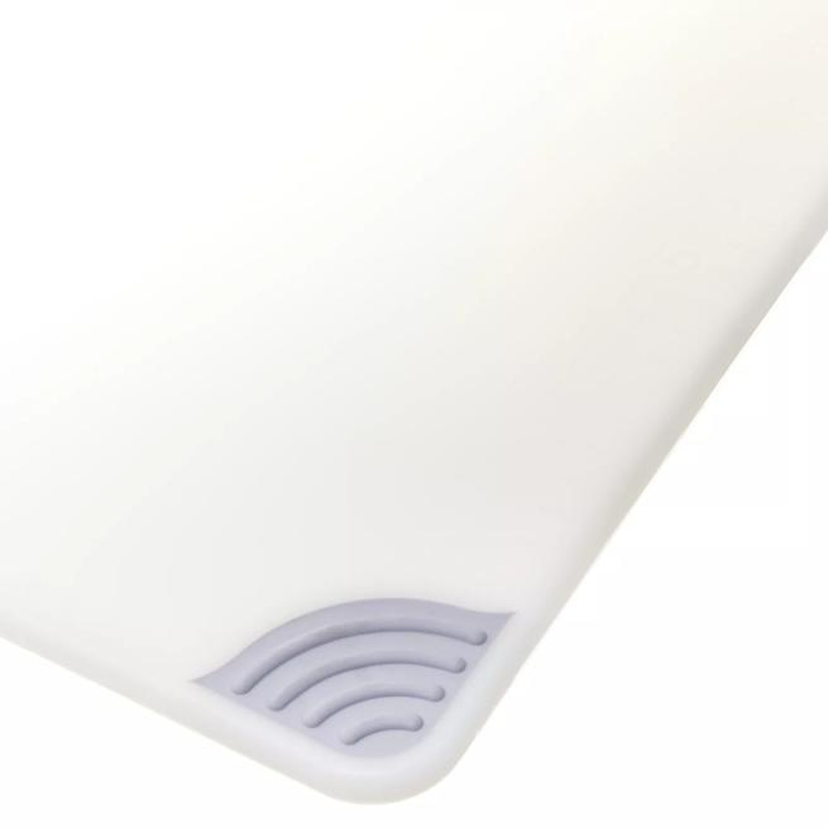 Close-up of gray anti-slip grip corner pad on the white Saf-T-Grip cutting board
