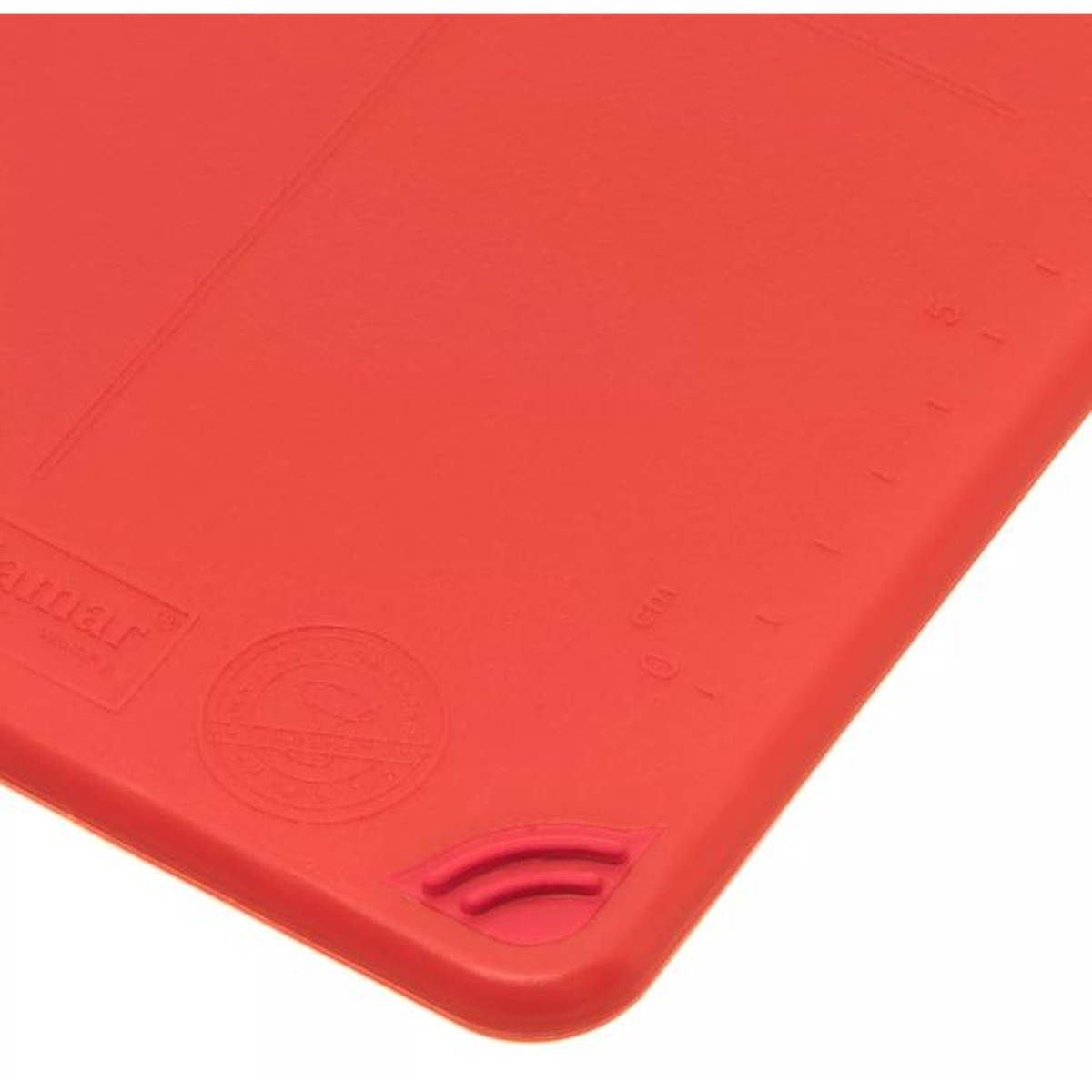 Close-up of the molded-in ruler markings and NSF certification stamp on the red Saf-T-Grip cutting board