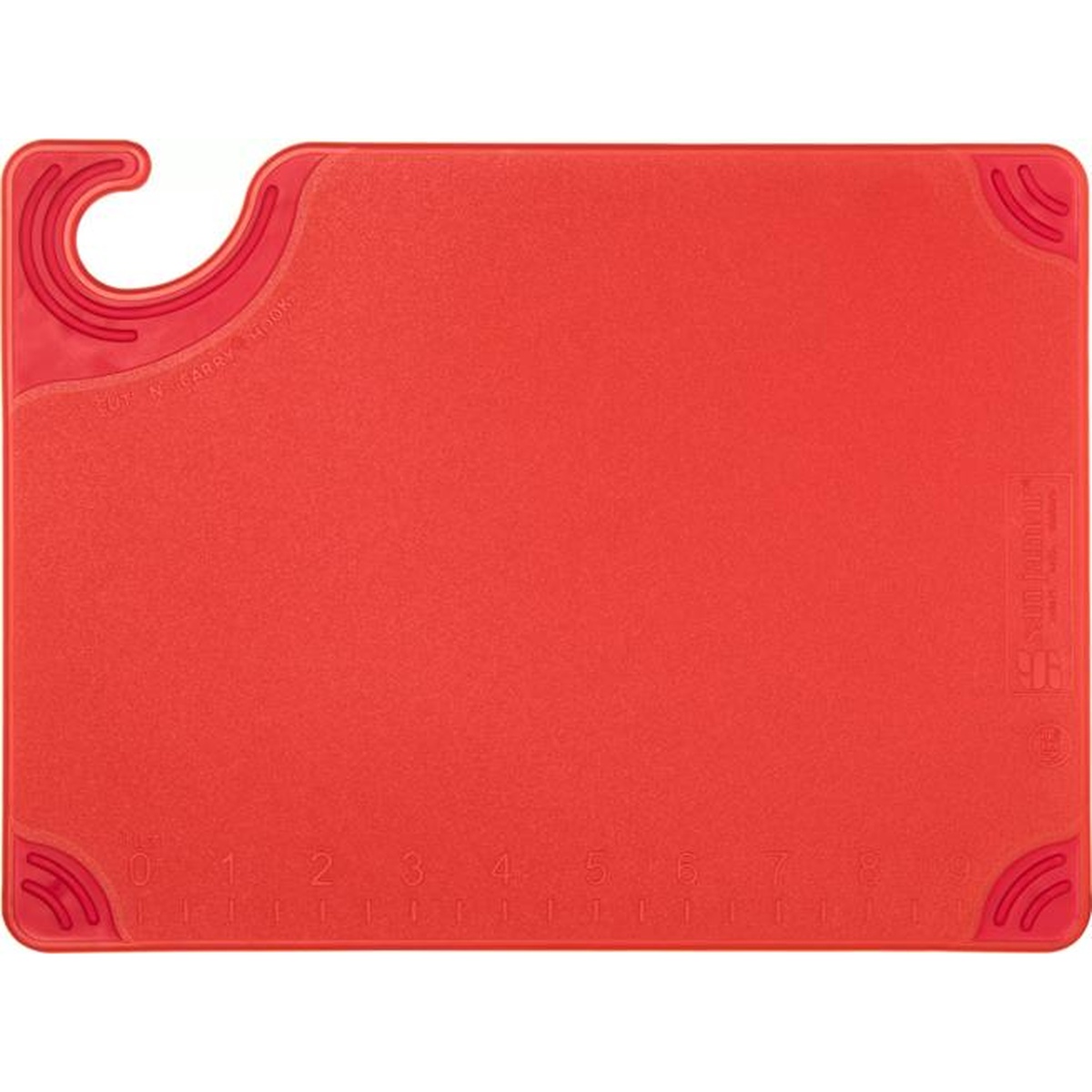 Top-down view of red San Jamar cutting board showing molded ruler markings and anti-slip grip corners