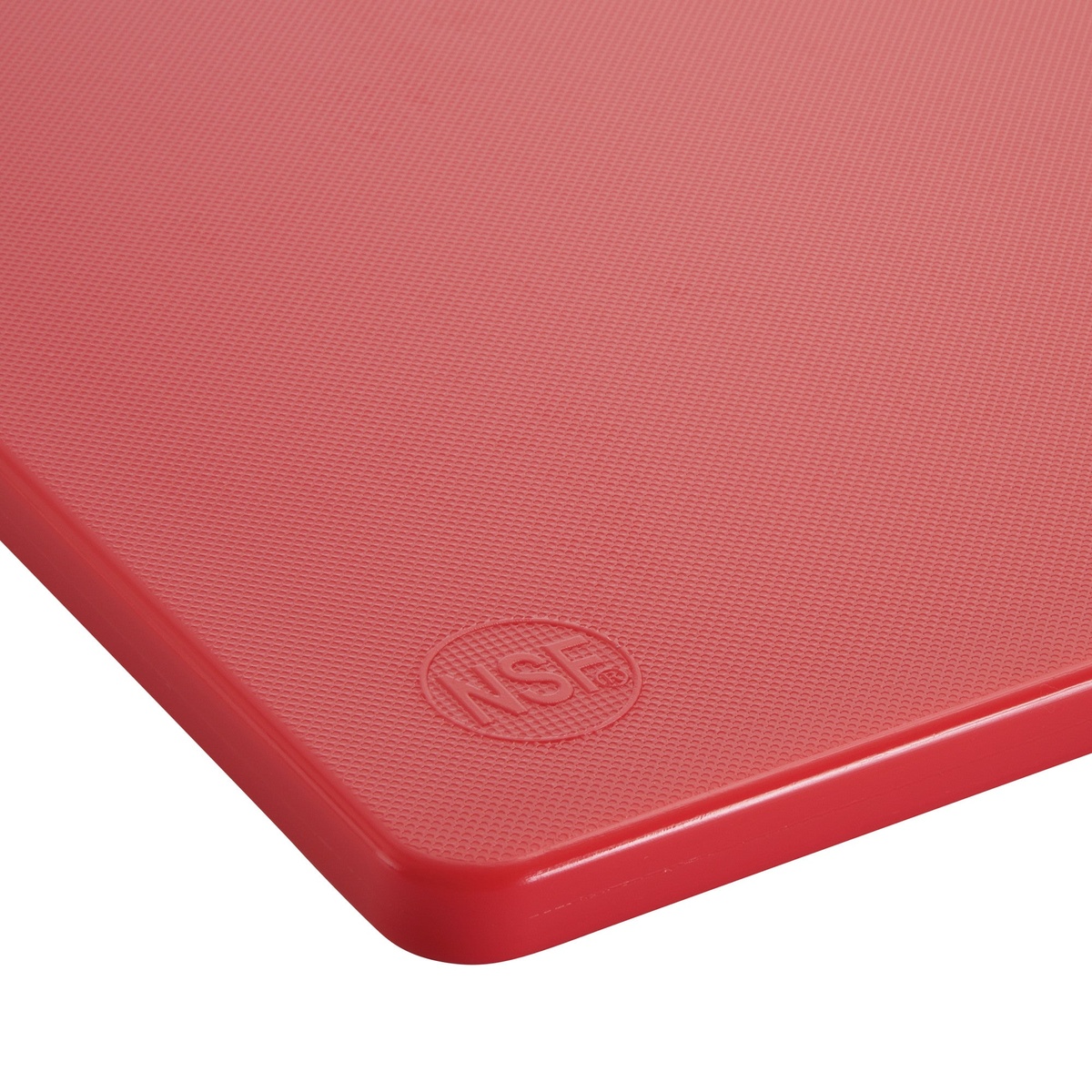 Close-up of Winco CBRD-1520 red cutting board corner showing NSF certification mark and textured surface