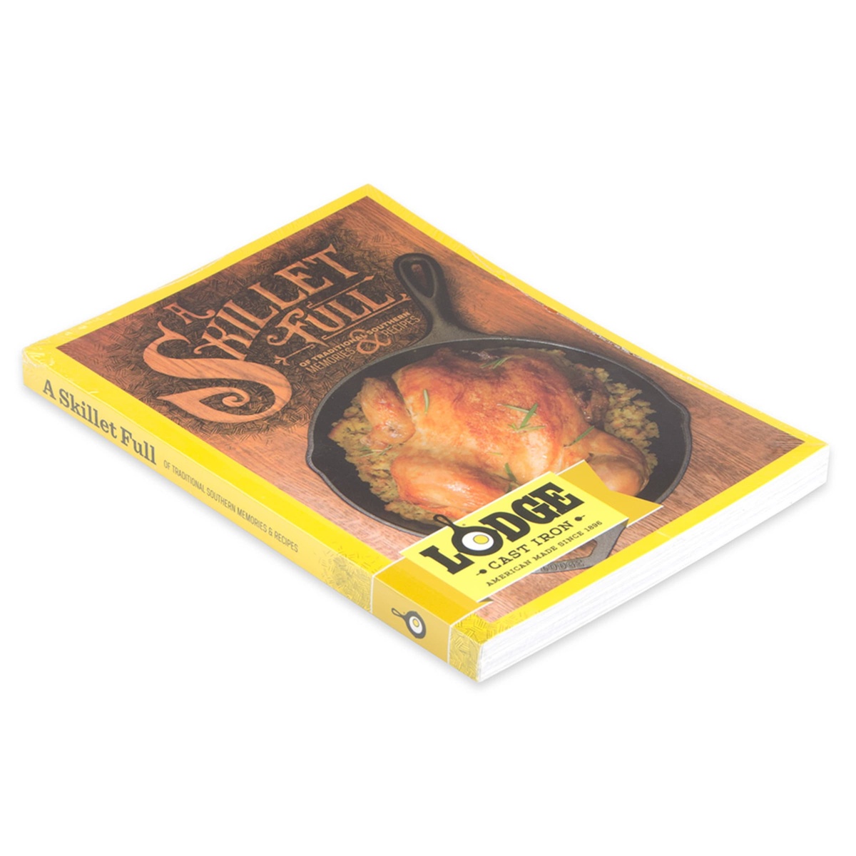 Angled side view of Lodge A Skillet Full cookbook showing cover and spine