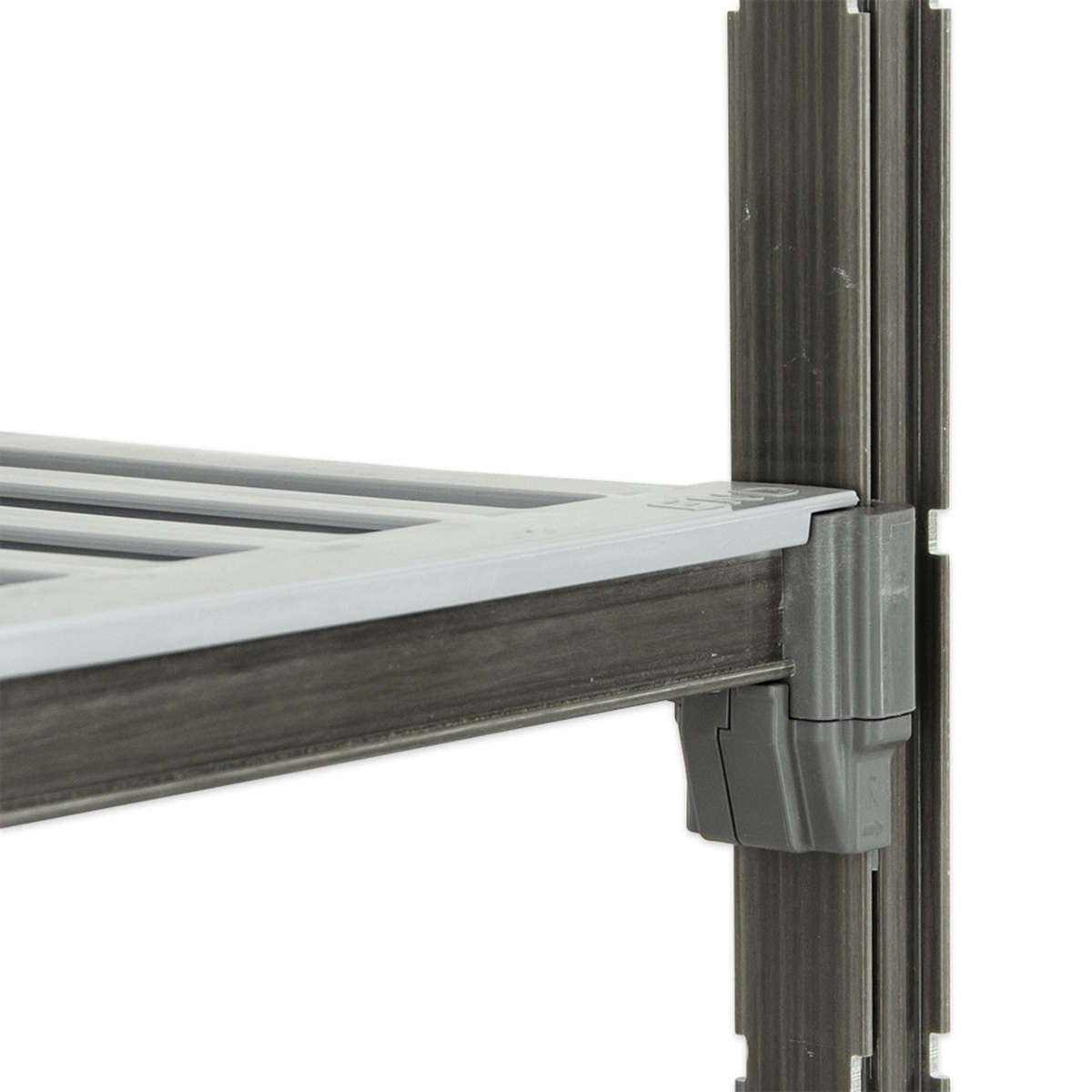 Close-up detail of Cambro Camshelving composite post connector and shelf traverse locking mechanism
