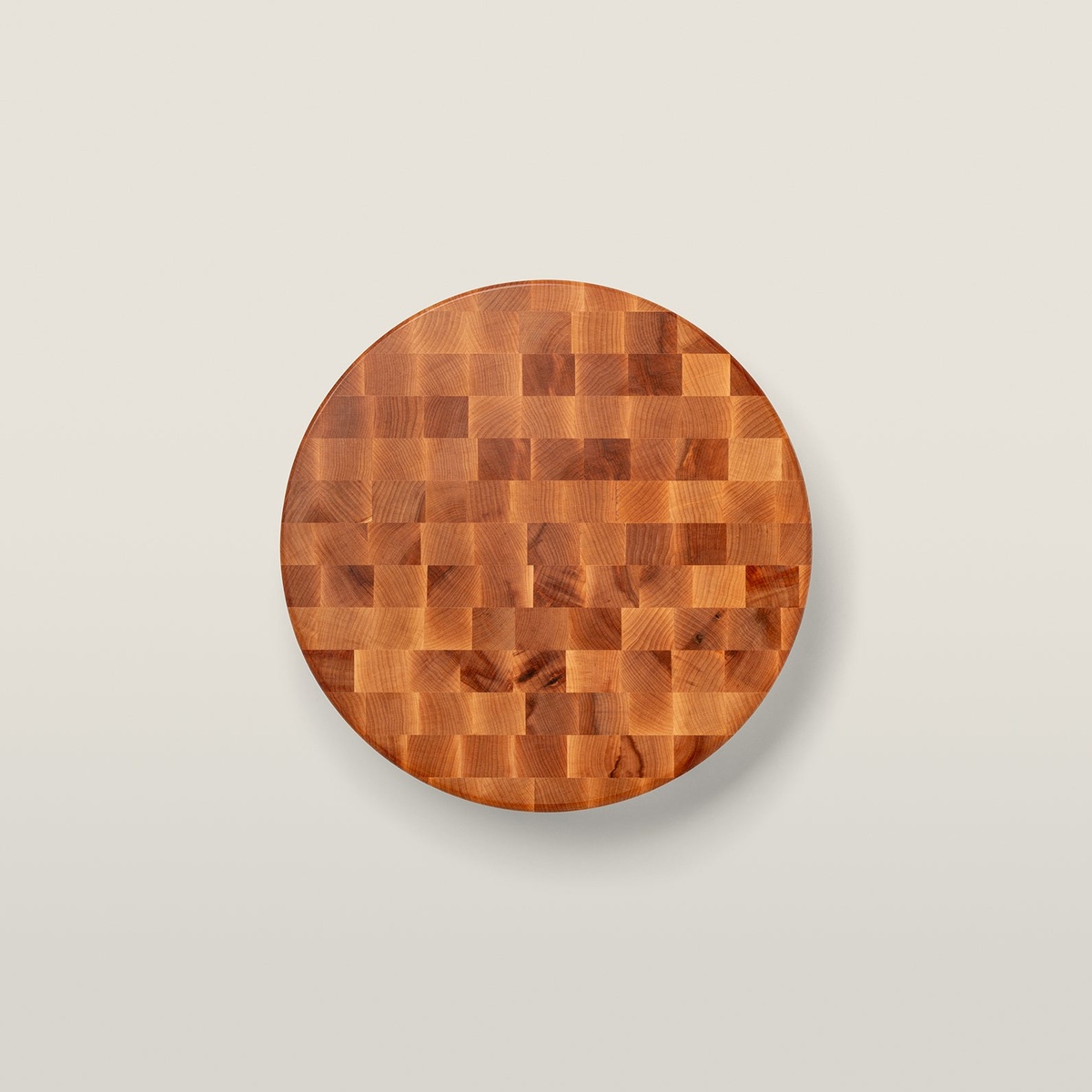 Top-down view of John Boos CCB18-R 18-inch round end grain maple chopping block showing iconic checkerboard pattern