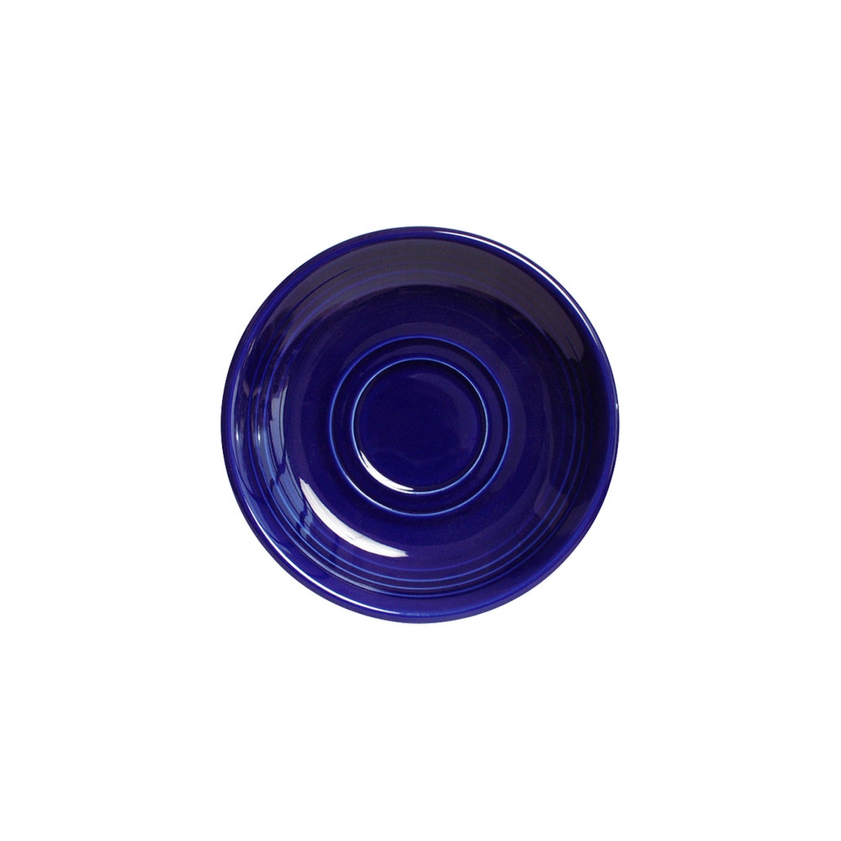 Tuxton CCE-060 Concentrix 6-inch round cobalt china saucer viewed from above, showing concentric ridges and deep cobalt glaze