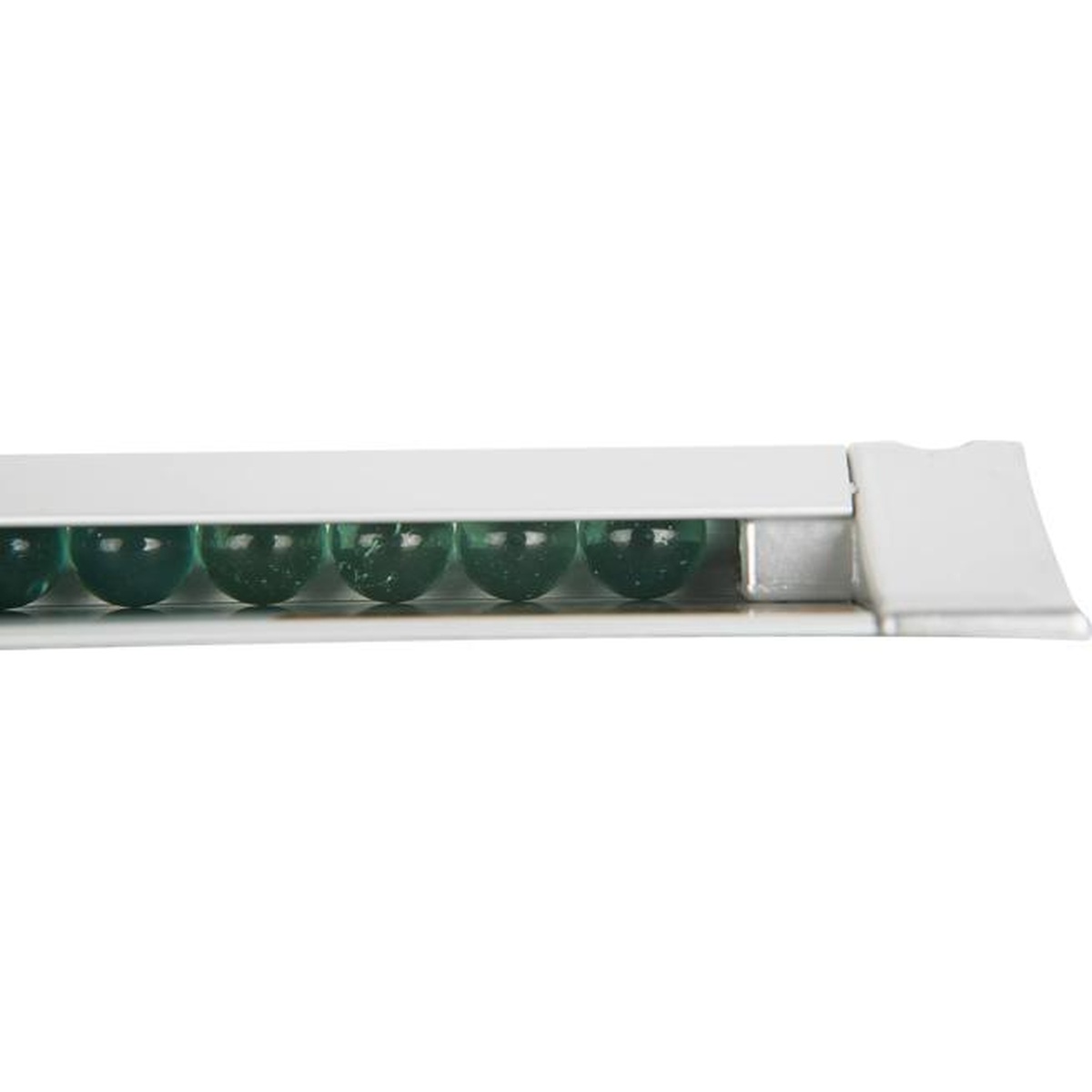 Close-up view of polished glass beads inside the aluminum check rack channel