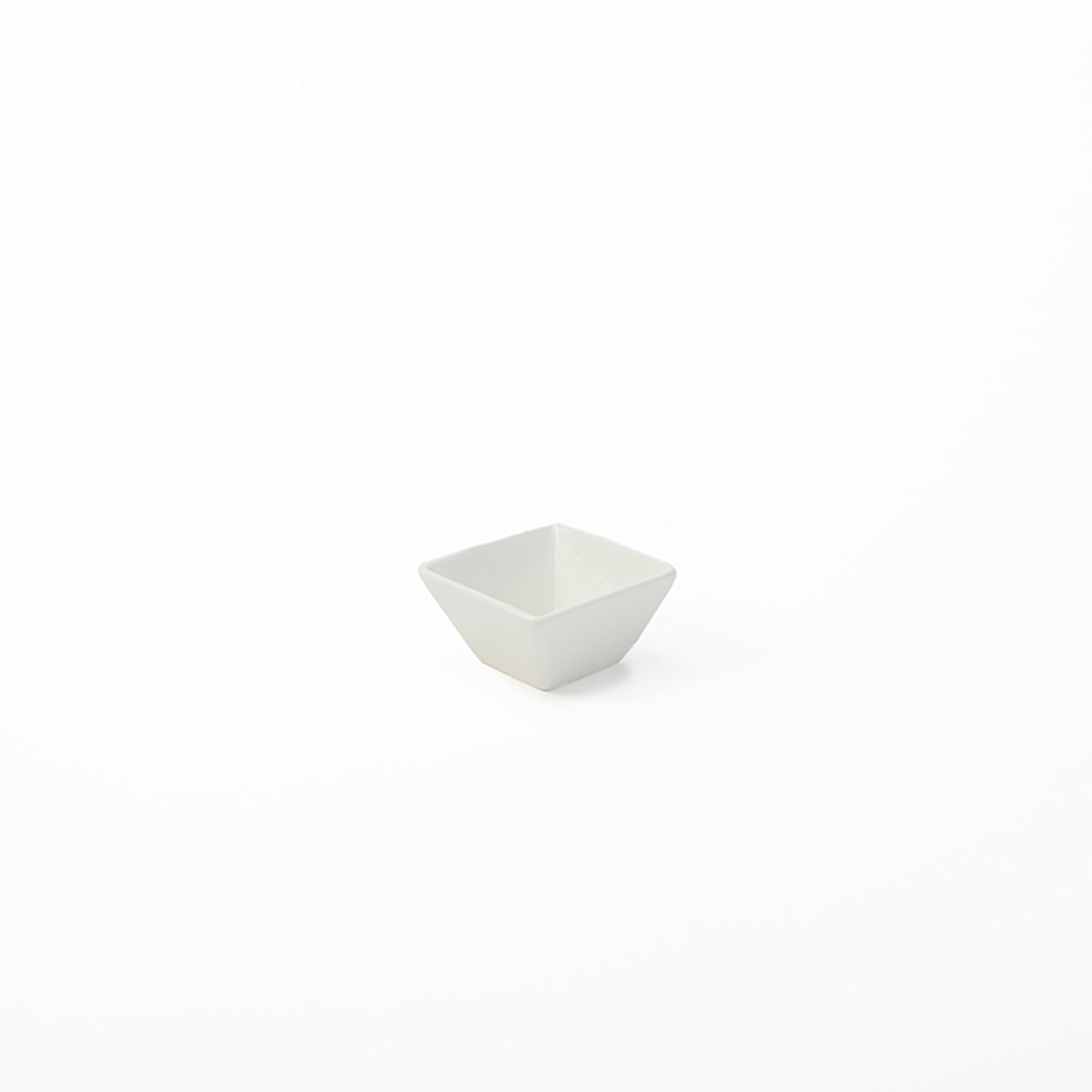 American Metalcraft CSC20 white square porcelain sauce cup with flared sides on white background