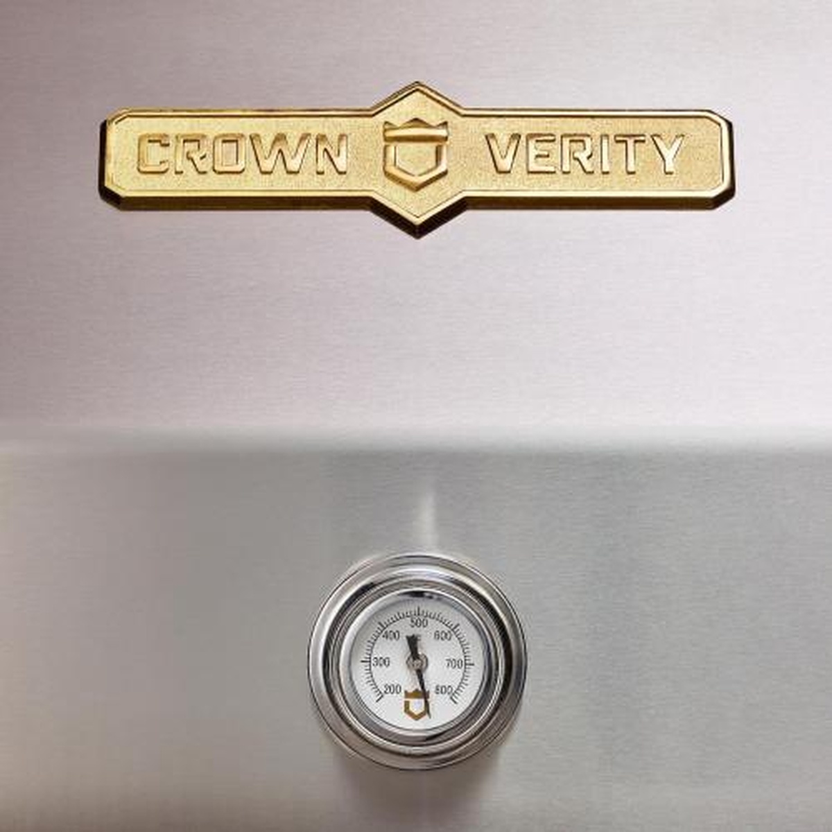 Close-up of Crown Verity grill lid with analog thermometer