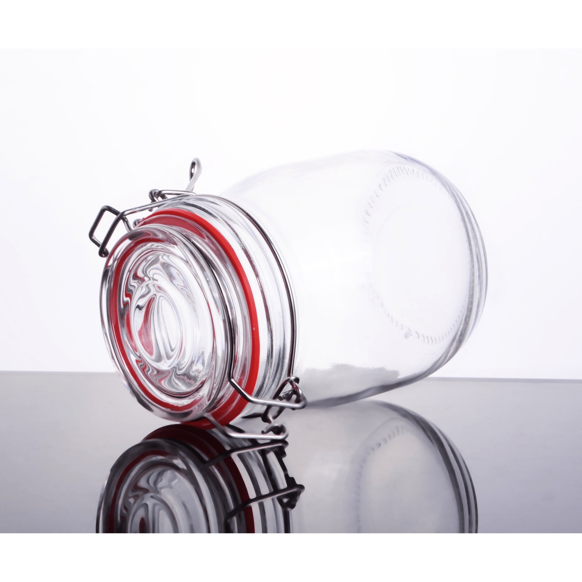 Enhanced glass storage jar shown on its side, highlighting the glass lid, red rubber gasket, and wire bail latch detail