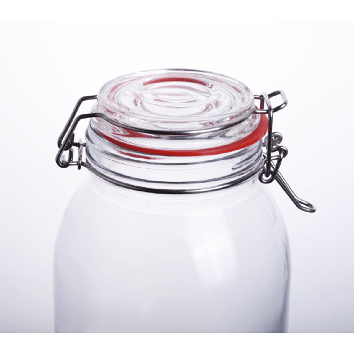 Close-up of the glass lid, red rubber gasket, and wire bail latch mechanism of the Enhanced storage jar
