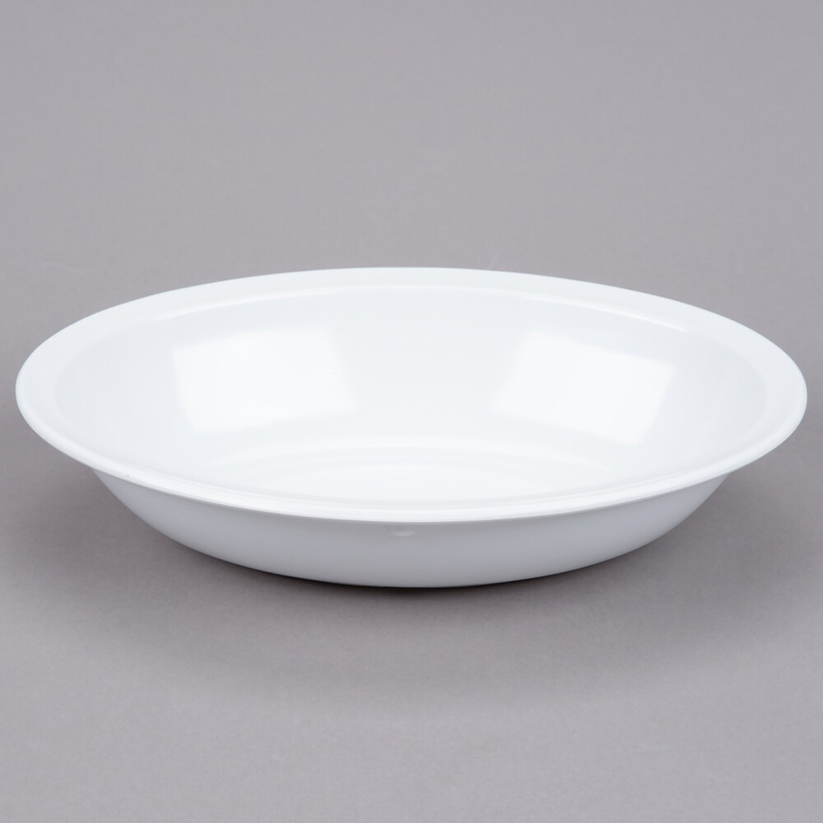 GET DN-332-W white oval melamine serving bowl, 32 oz., viewed from a slight angle showing the rimmed profile and footed base