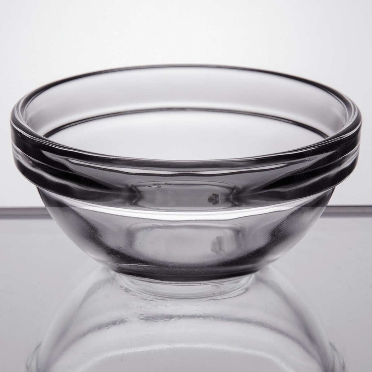 Arcoroc E9156 2.75 oz clear glass stackable ingredient bowl showing stacked profile
