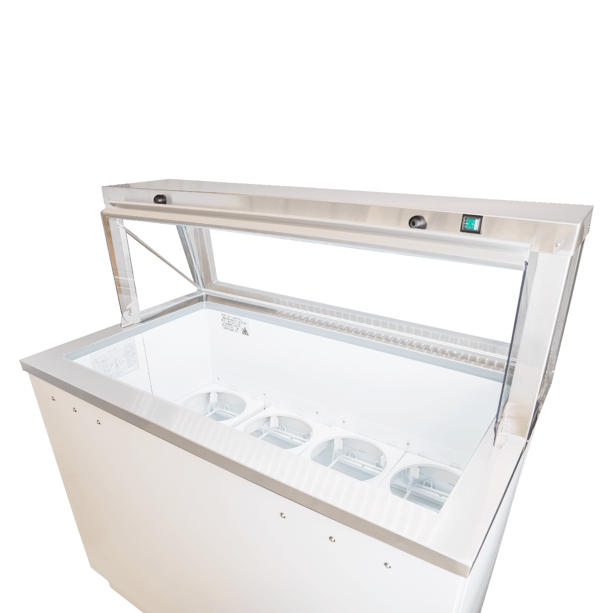 Interior view of dipping cabinet with sneeze guard open, showing organized ice cream tub holders and dividers