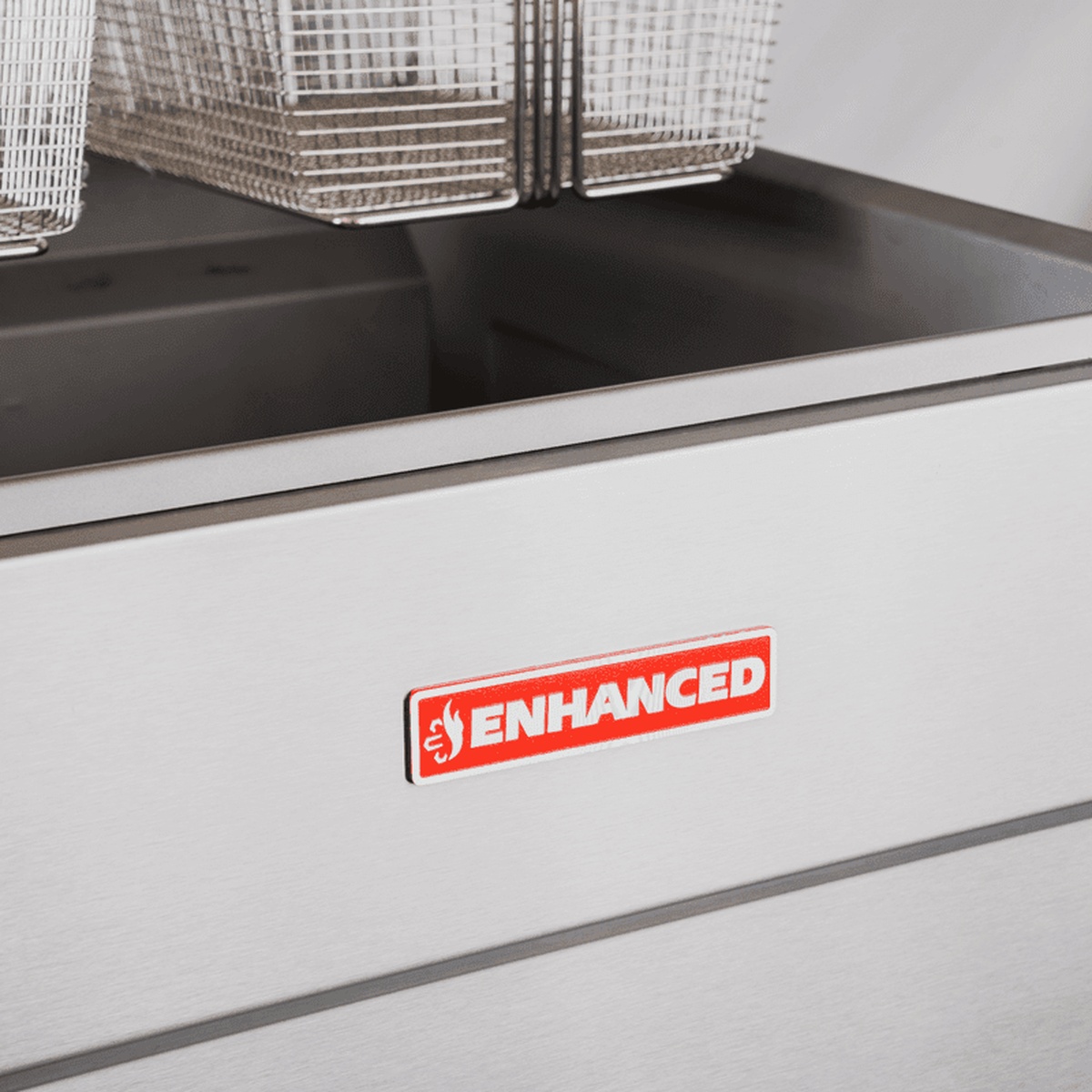 Close-up of Enhanced brand badge on the stainless steel front panel of the EGF-150-N fryer