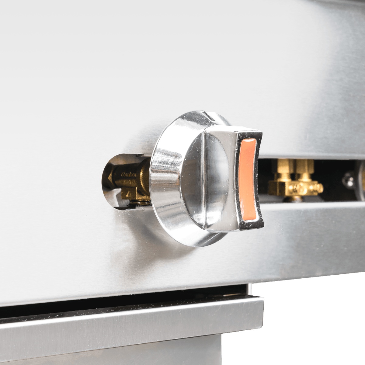 Close-up of the chrome manual control knob and brass gas valve on the Enhanced EHDG-36-1 griddle