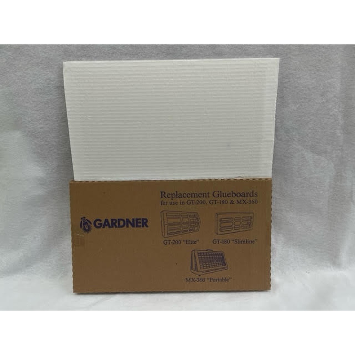 Gardner EL-61 white glueboard panel shown next to its cardboard packaging box