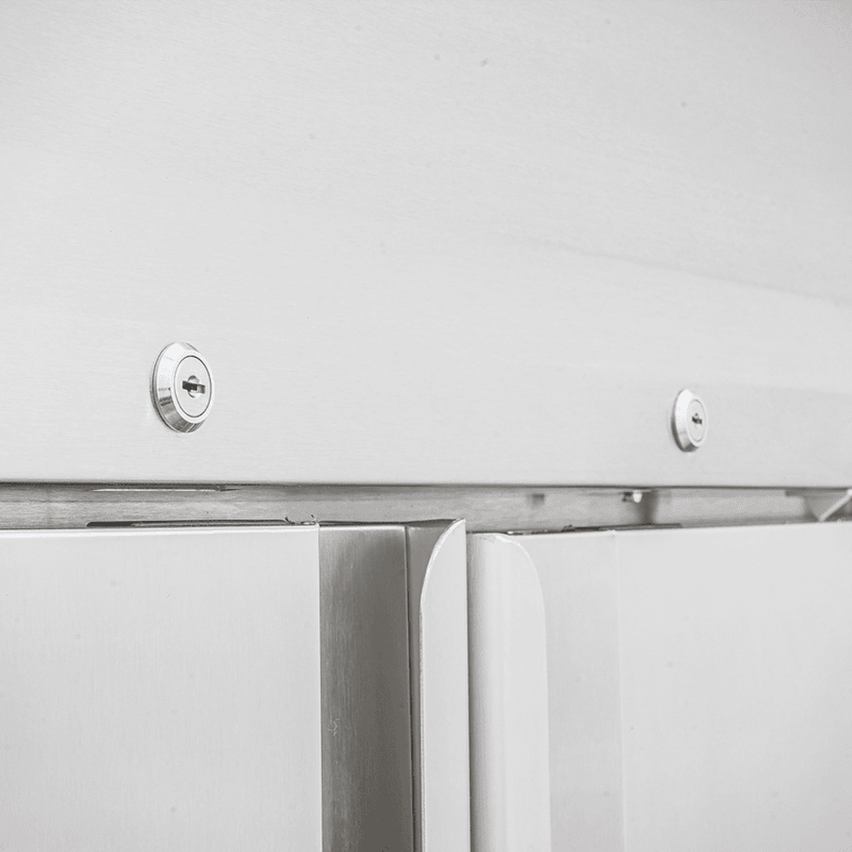 Close-up of dual door key locks and stainless steel handle hardware on the ERS-35F-HC freezer