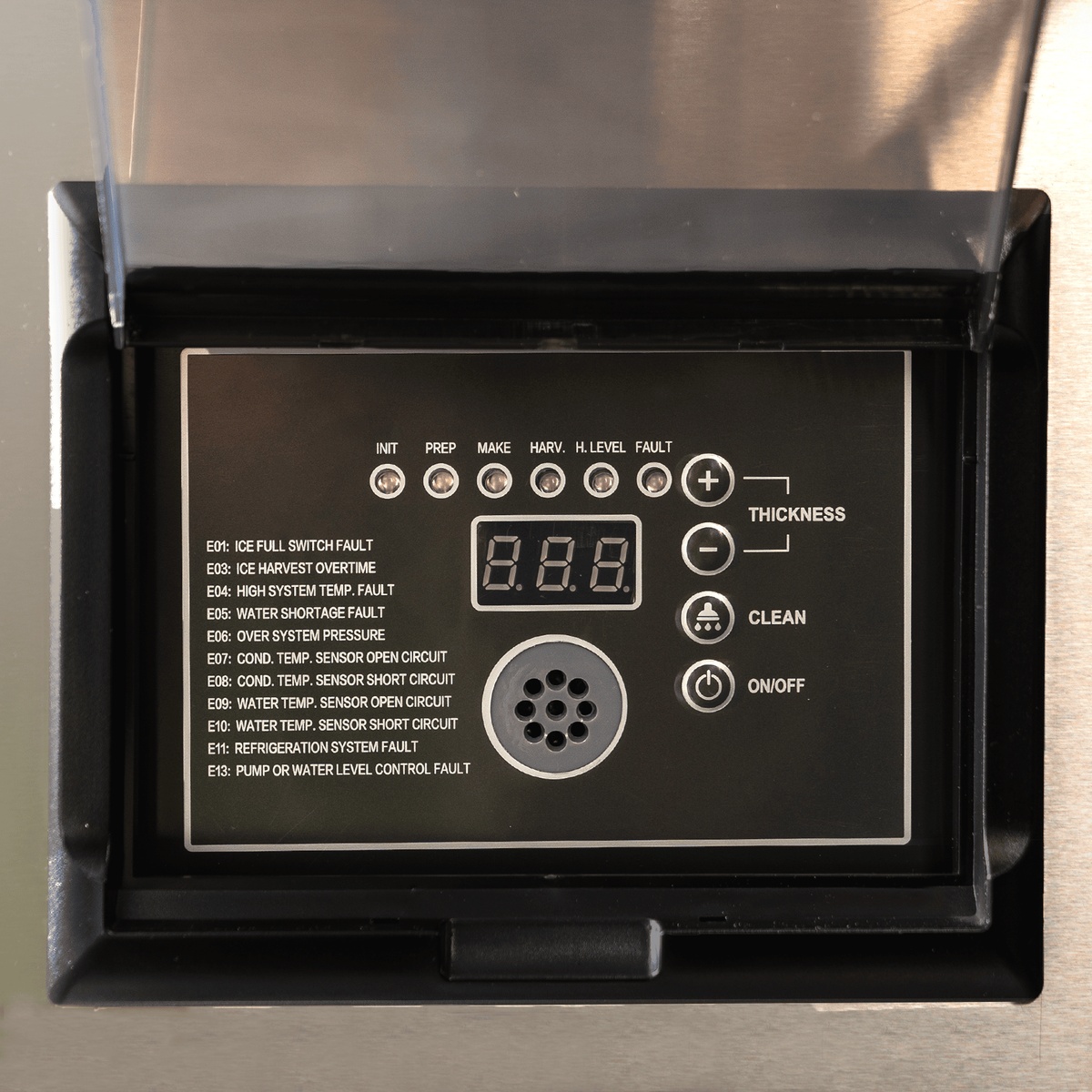 ESK-529 digital control panel showing status indicators, thickness adjustment buttons, clean cycle, and on/off controls