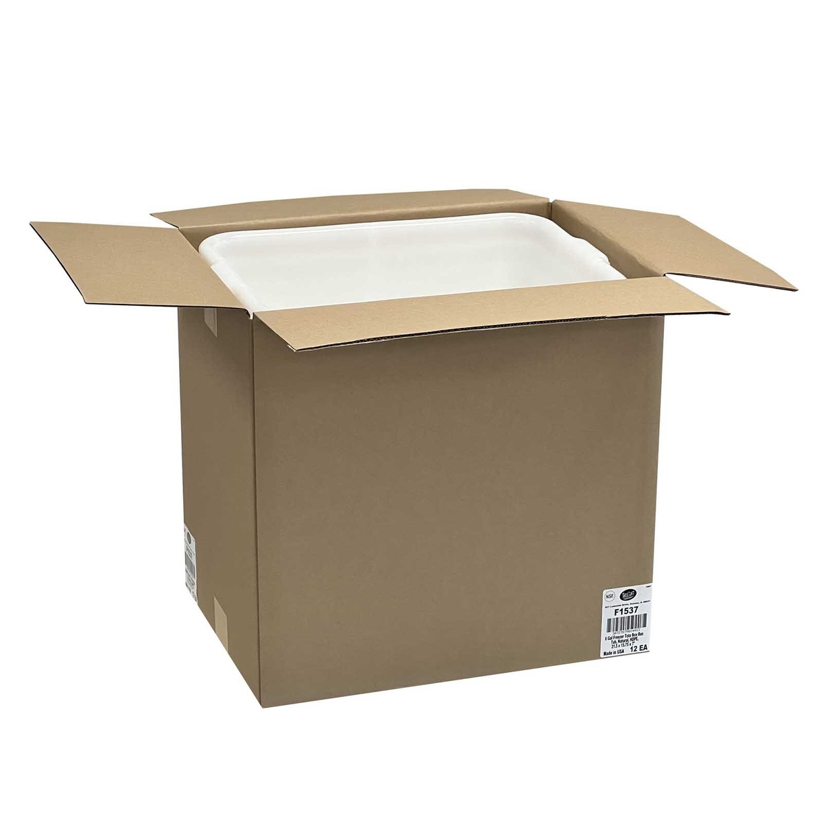 Open cardboard master case shipping box containing a white TableCraft F1537 freezer storage box, with NSF certification label visible on the exterior