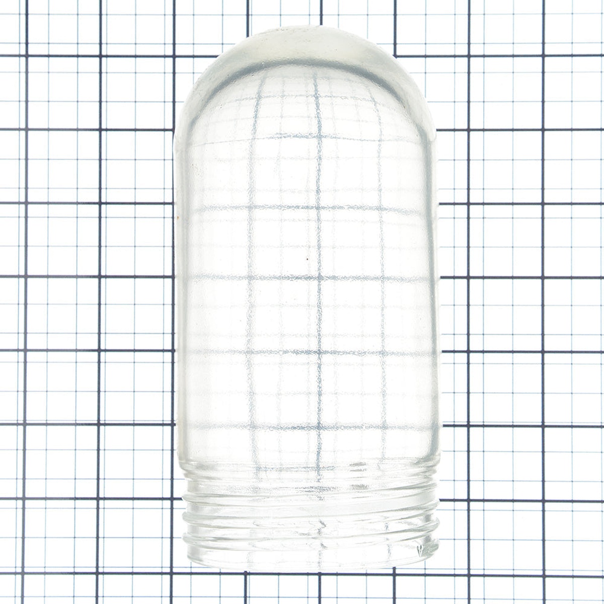 Shat-R-Shield G1001 clear glass globe shown against measurement grid to illustrate size