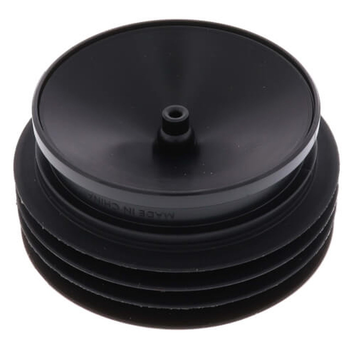 Bottom view of the GD104 Green Drain showing the smooth silicone flapper cap and center nub