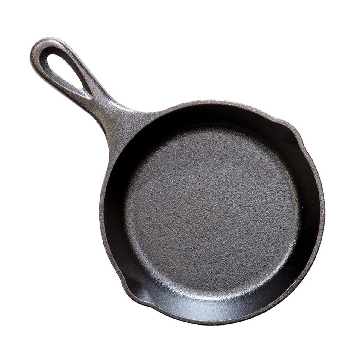 Top down view of a seasoned Lodge 5 inch mini cast iron skillet