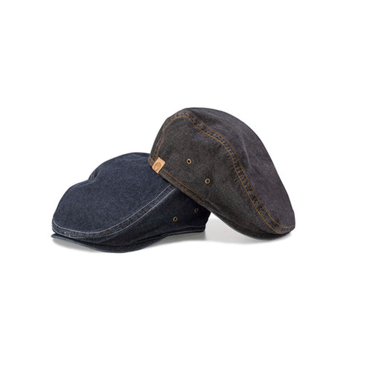 Chef Works Manhattan Driver Cap in black and indigo denim, showing contrast topstitching and stitched eyelets