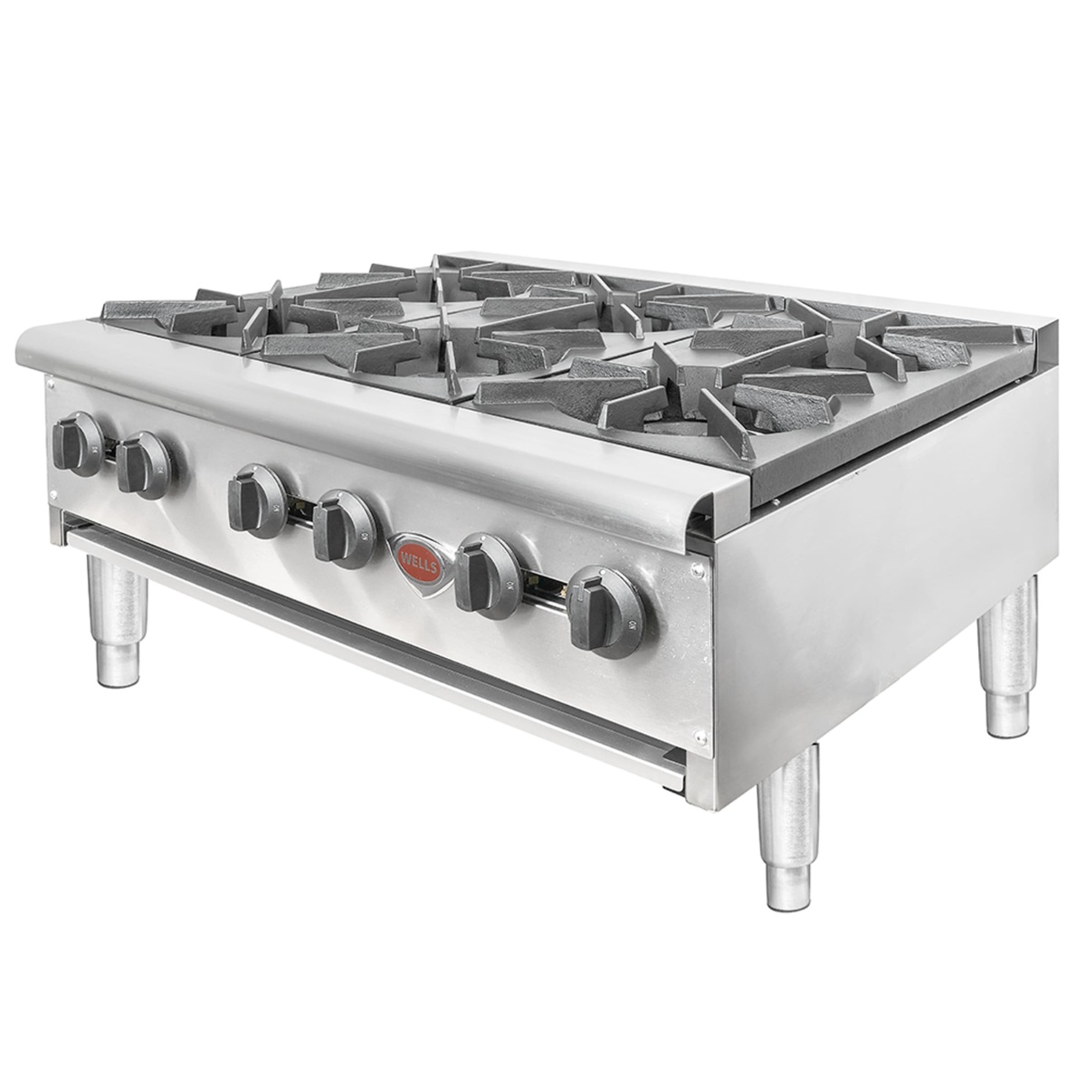 Angled view of Wells HDHP-3630G hot plate showing six control knobs and cast iron grates