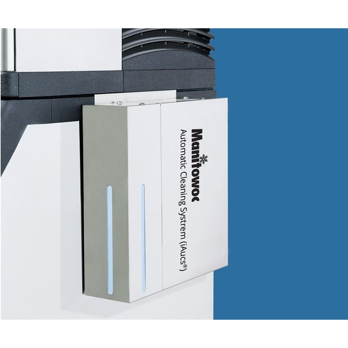 Manitowoc iAuCS Automatic Cleaning System unit mounted on the exterior of an Indigo ice machine