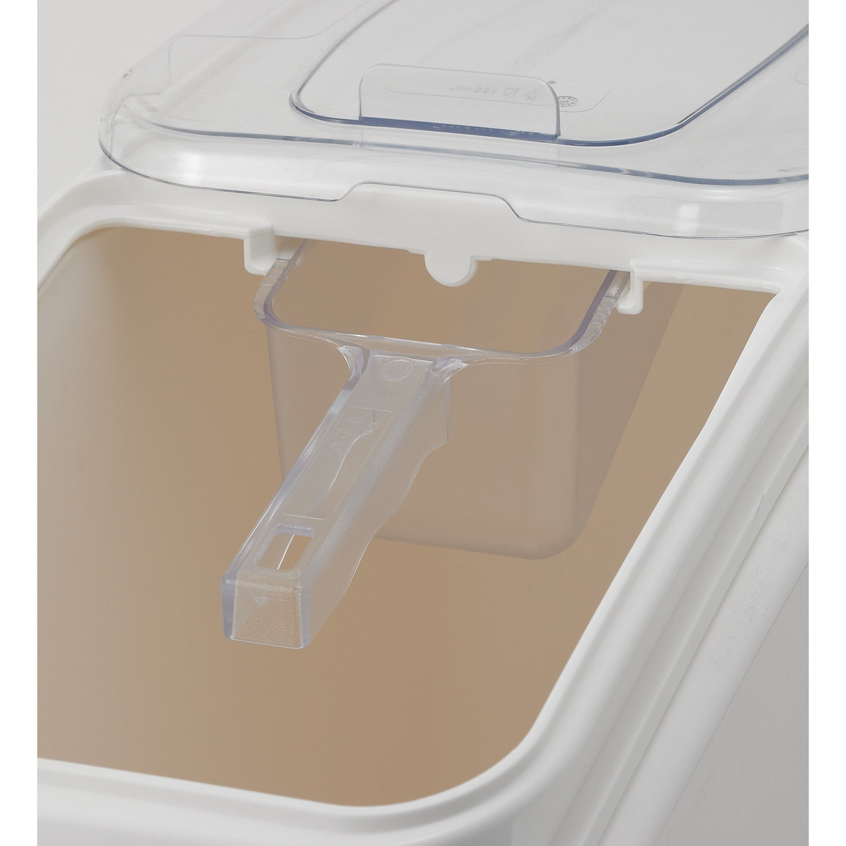 Close-up of Winco IB-21 interior showing built-in scoop holder and clear polycarbonate sliding lid