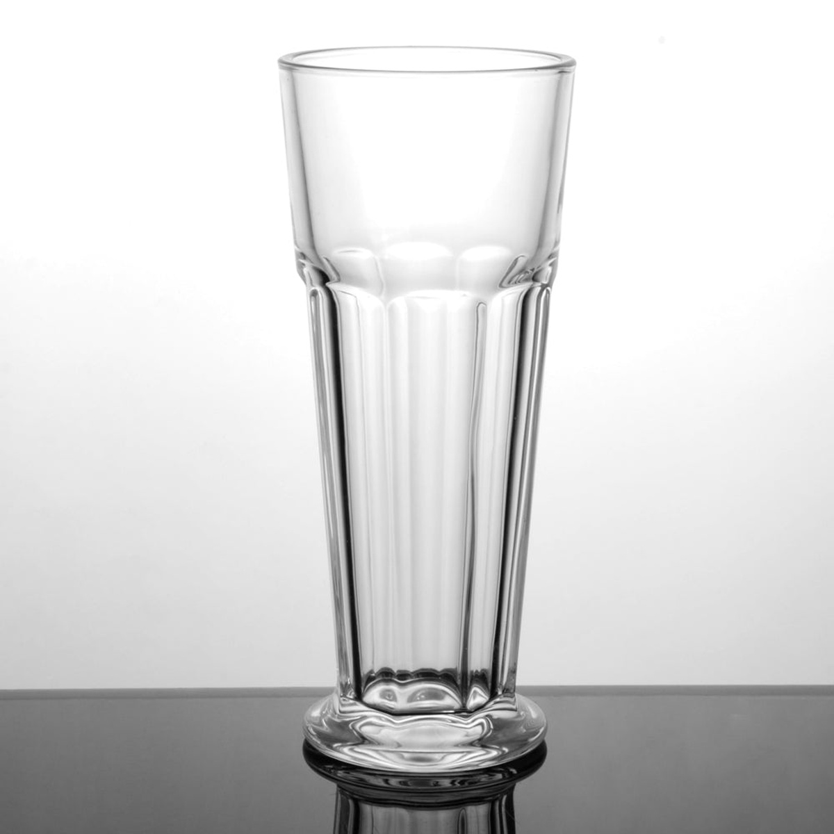 IC-17 Enhanced 14 oz footed pilsner glass, full view on reflective surface