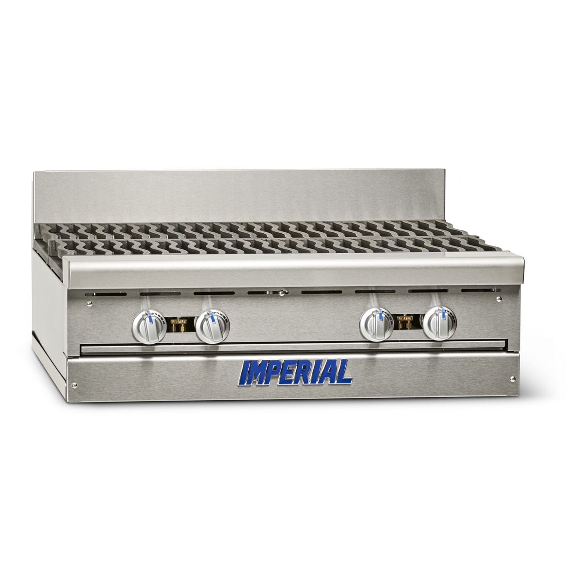 Close-up of Imperial IHR-4 cooktop with cast iron grates and burner control knobs