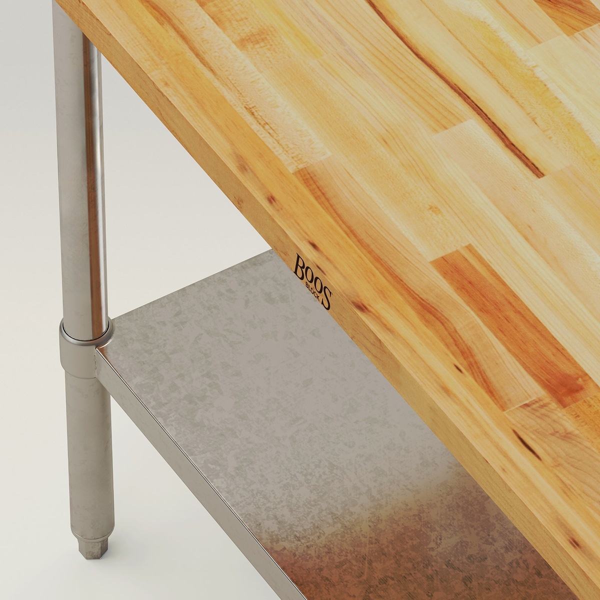 Close-up detail of John Boos JNS02 maple top surface and galvanized undershelf corner joint