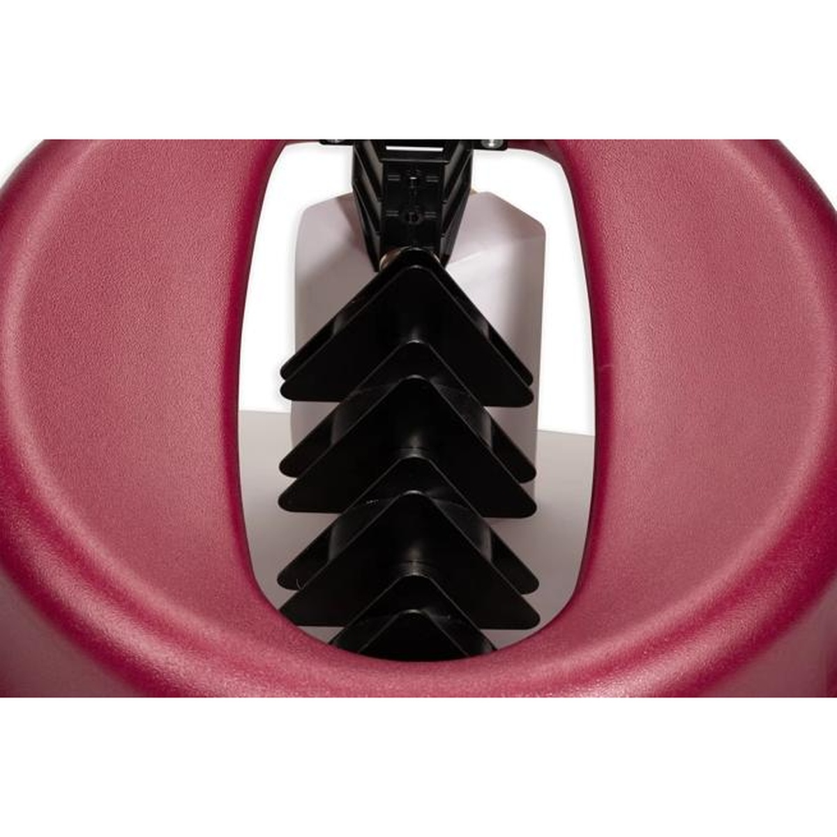 Close-up view of the black magnetic bar mechanism inside the oval opening of the KatchAll flatware retriever lid