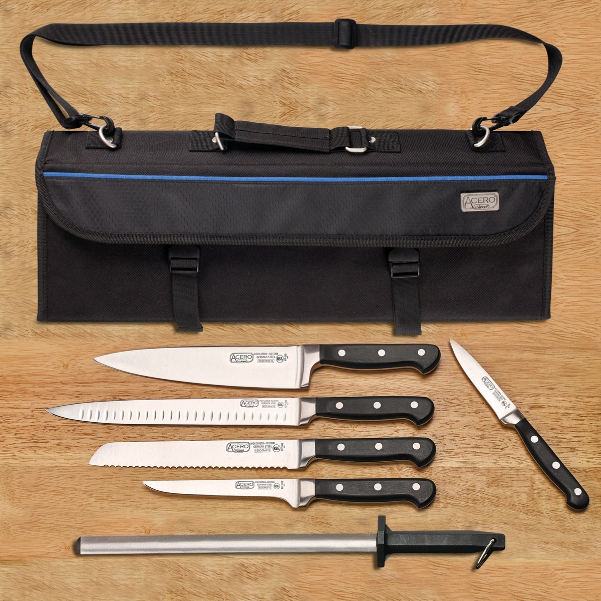 Winco Acero KFP-KITA knife set displayed on a wooden surface alongside the 11-slot black knife bag, showing the chef knife, boning knife, bread knife, slicer, paring knife, sharpening steel, and shears