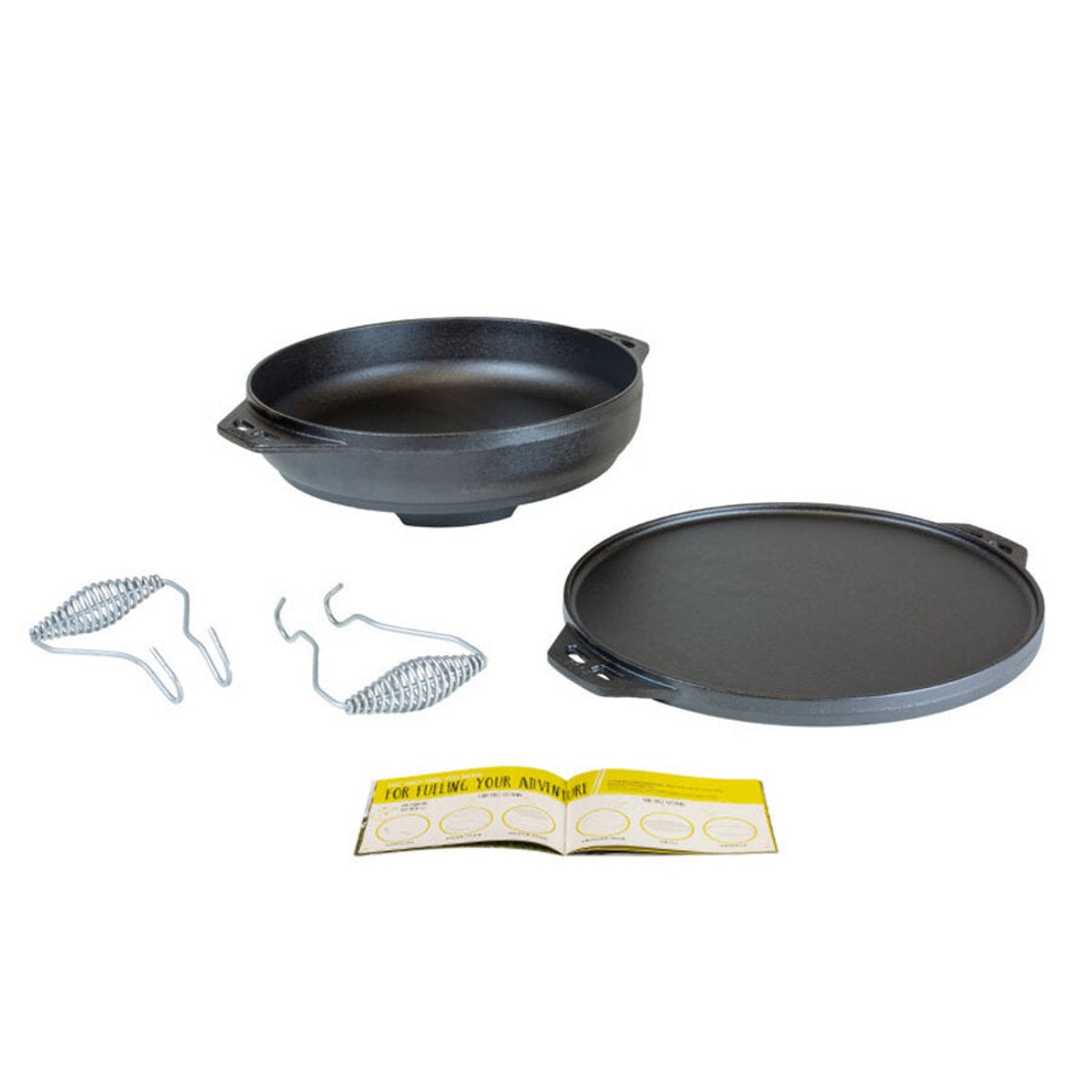Lodge Cast Iron Cook-It-All complete set laid out including wok base, reversible grill griddle, hook and carry handles, and tips booklet