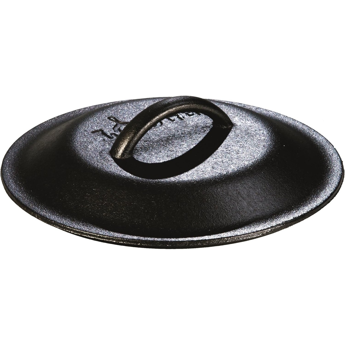Close up view of the Lodge cast iron lid showing the integral handle and textured surface
