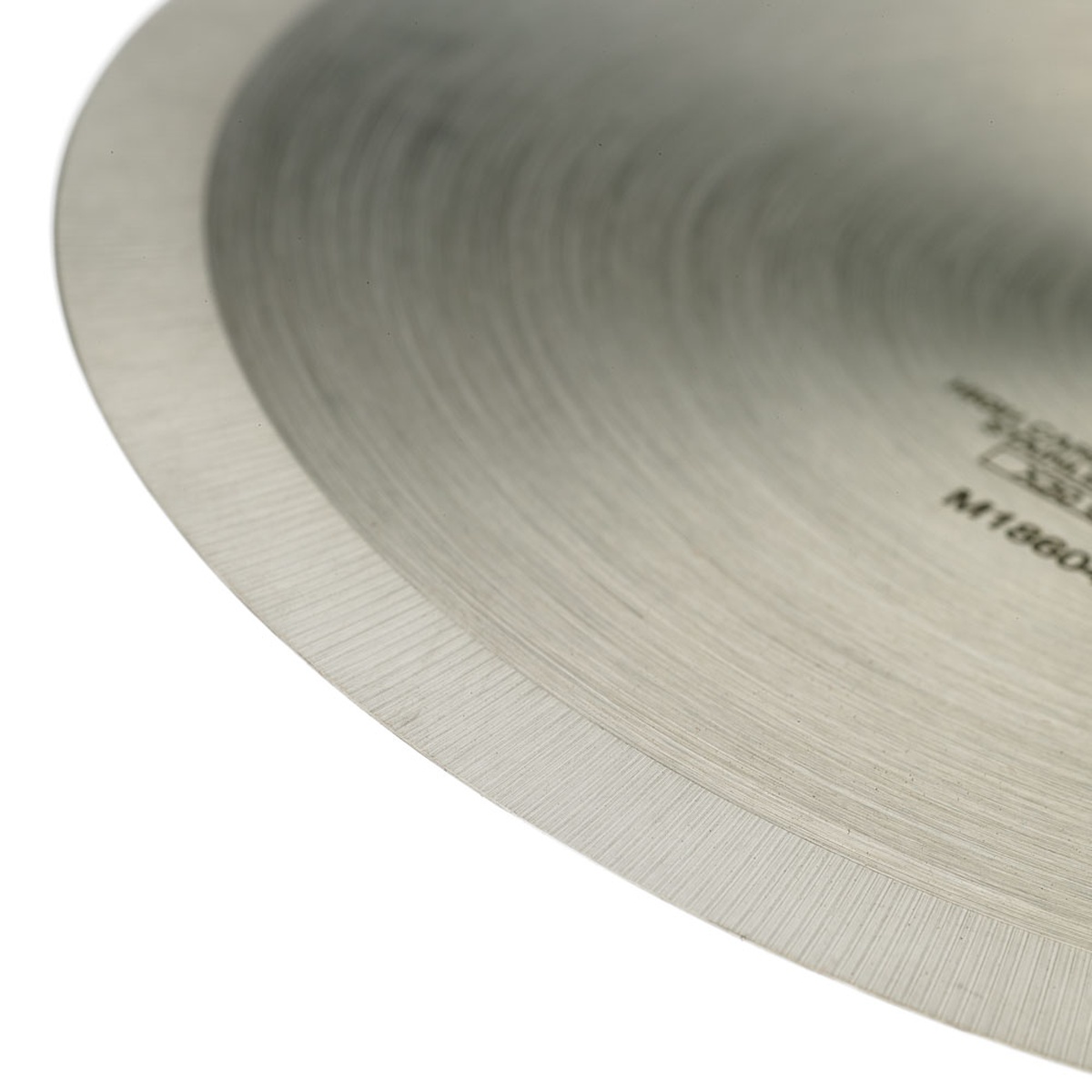 Close-up detail of the precision-ground razor-sharp edge of the Mercer Culinary M18604RD high-carbon stainless steel pizza cutter wheel