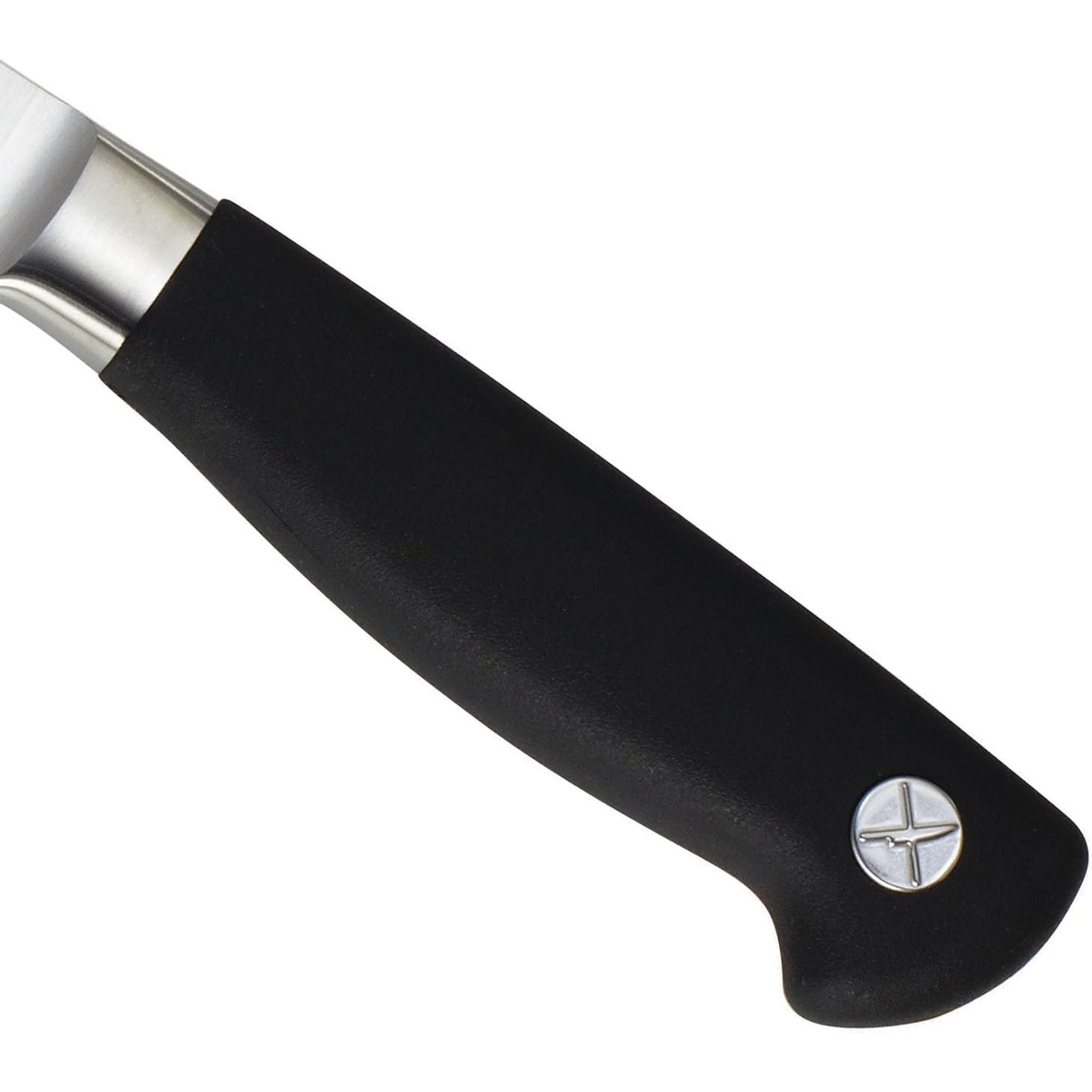 Close-up of the black Santoprene ergonomic handle and stainless bolster on the Mercer Genesis chef's knife