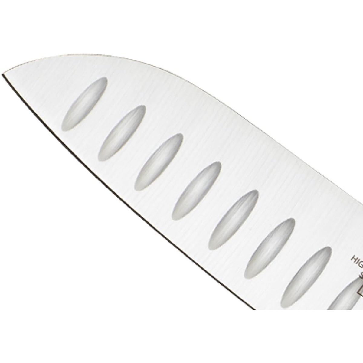 Close up of the Granton edge divots on a stainless steel knife blade