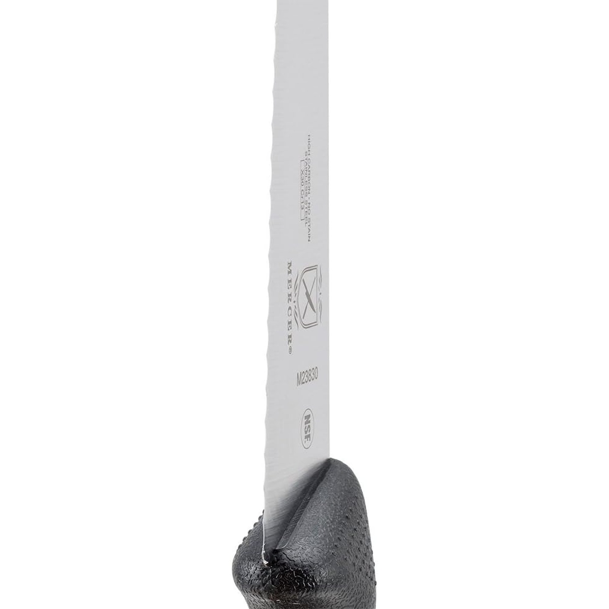 Close-up of Mercer Culinary M23830 blade showing wavy serrated edge, Mercer logo, model number, and NSF certification stamp