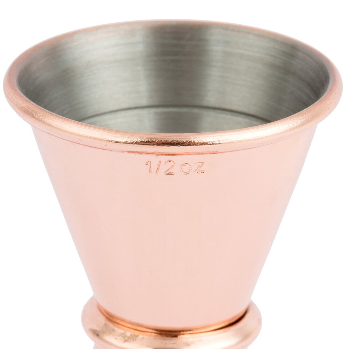 Close-up of copper-plated jigger top showing embossed 1/2 oz external measurement marking and satin stainless steel interior